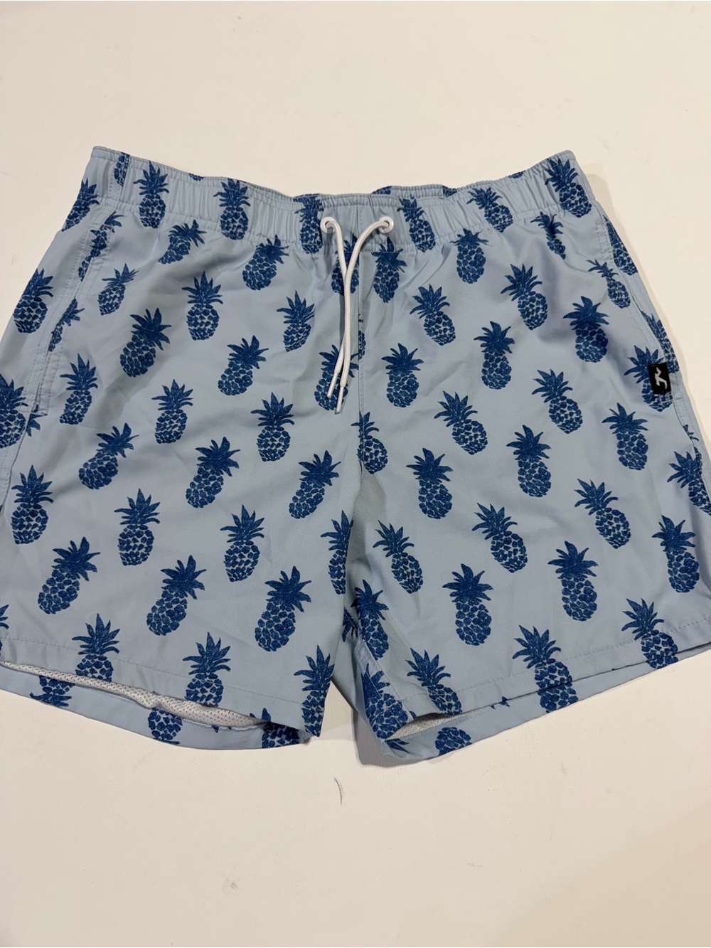 Hollister Light Blue Swim Trunks with Navy Pineapple Print